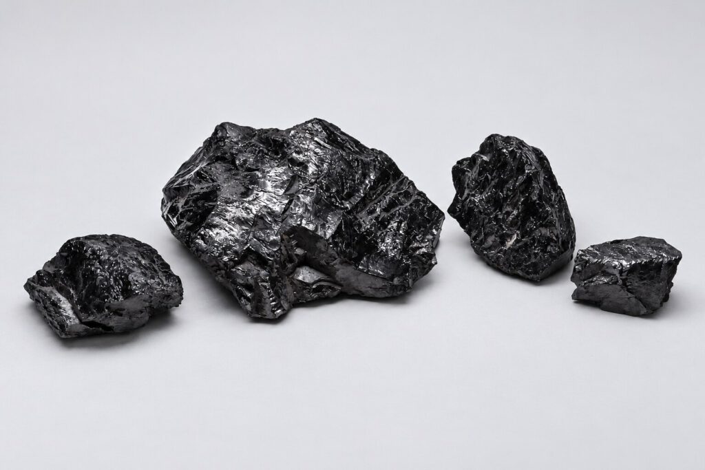 Glossy black lumps of anthracite coal