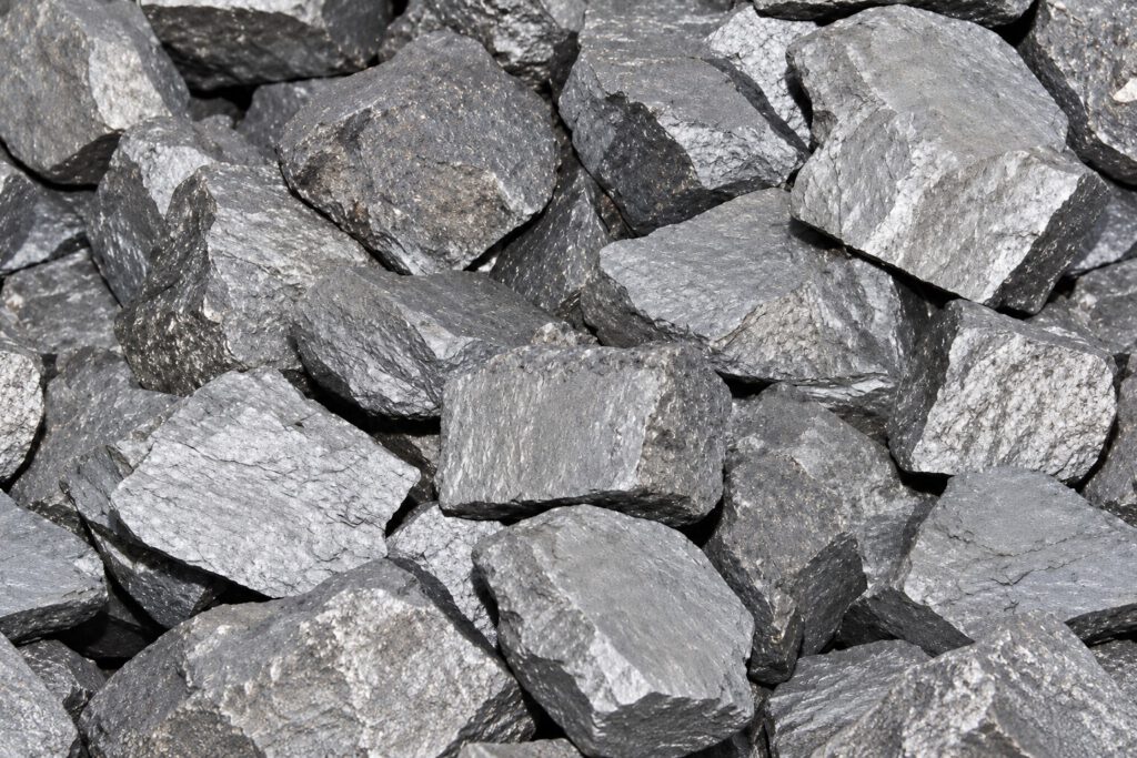 Pile of silvery-grey ferrosilicomanganese lumps